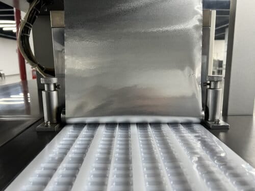 Heat sealing station