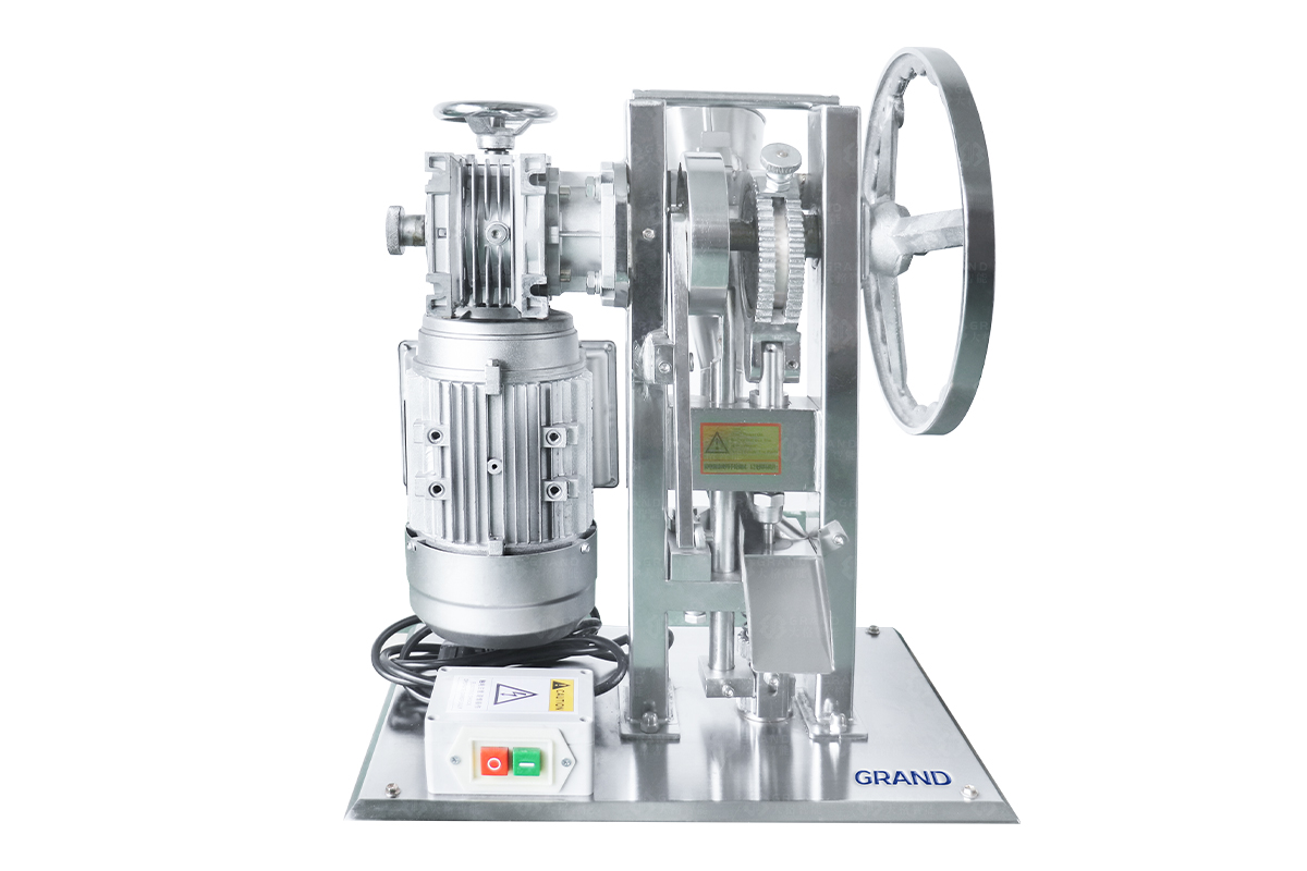Single punch tablet press-grand