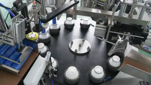 Ointment filling and sealing machine turntable