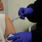 A man receives a flu shot—the flu has caused numerous infections and hospitalizations in the United States and elsewhere. Source H.BilbaoEuropa PressGetty