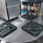 Bowl-shaped filling and sealing machine