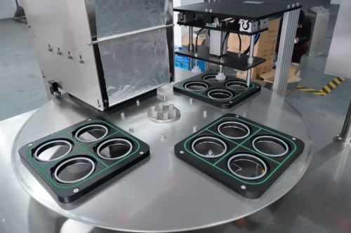 Bowl-shaped filling and sealing machine