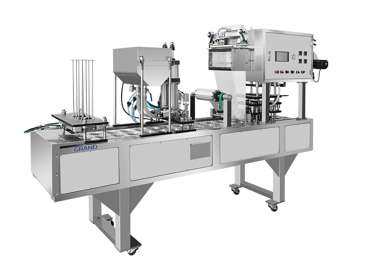 Continuous filling and sealing machine - Grand