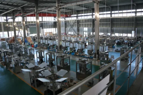 The capsule filling machines at the Grand factory are neatly arranged.